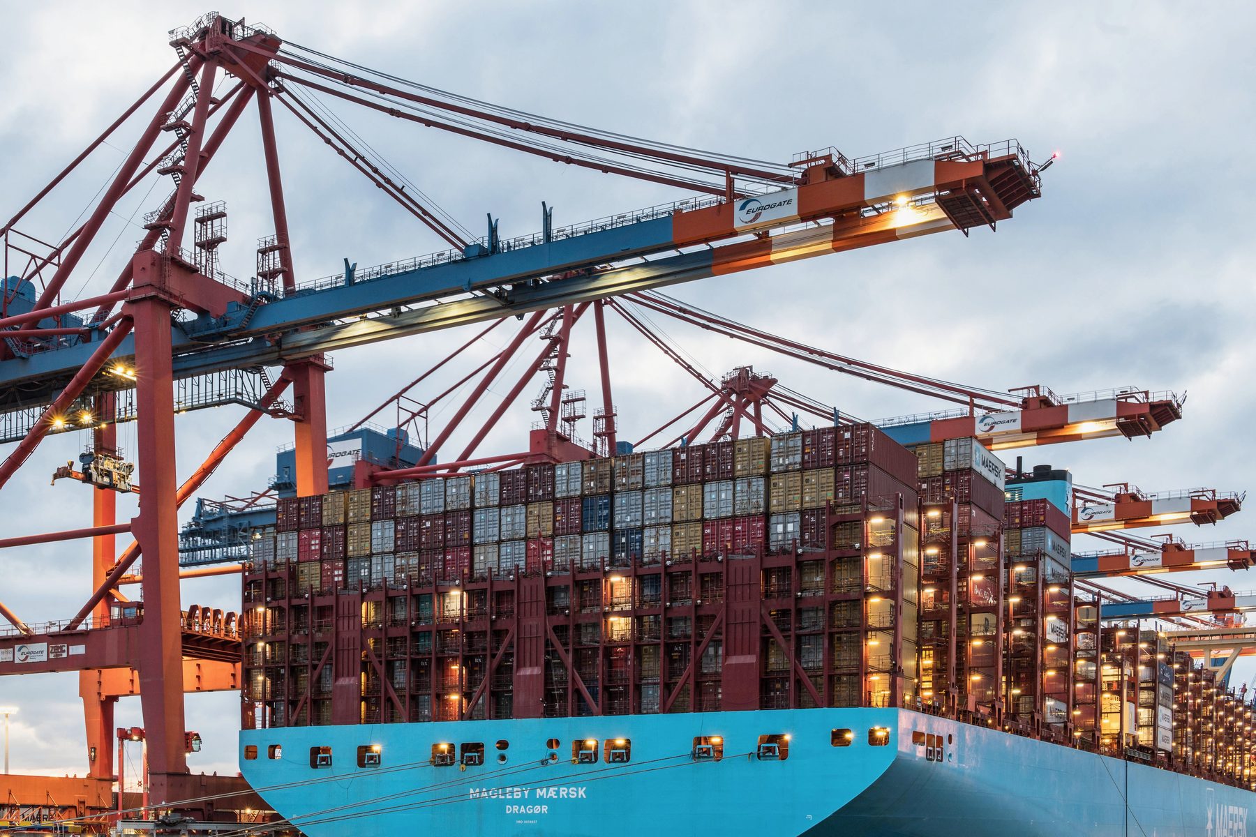 Container ship and cranes at port